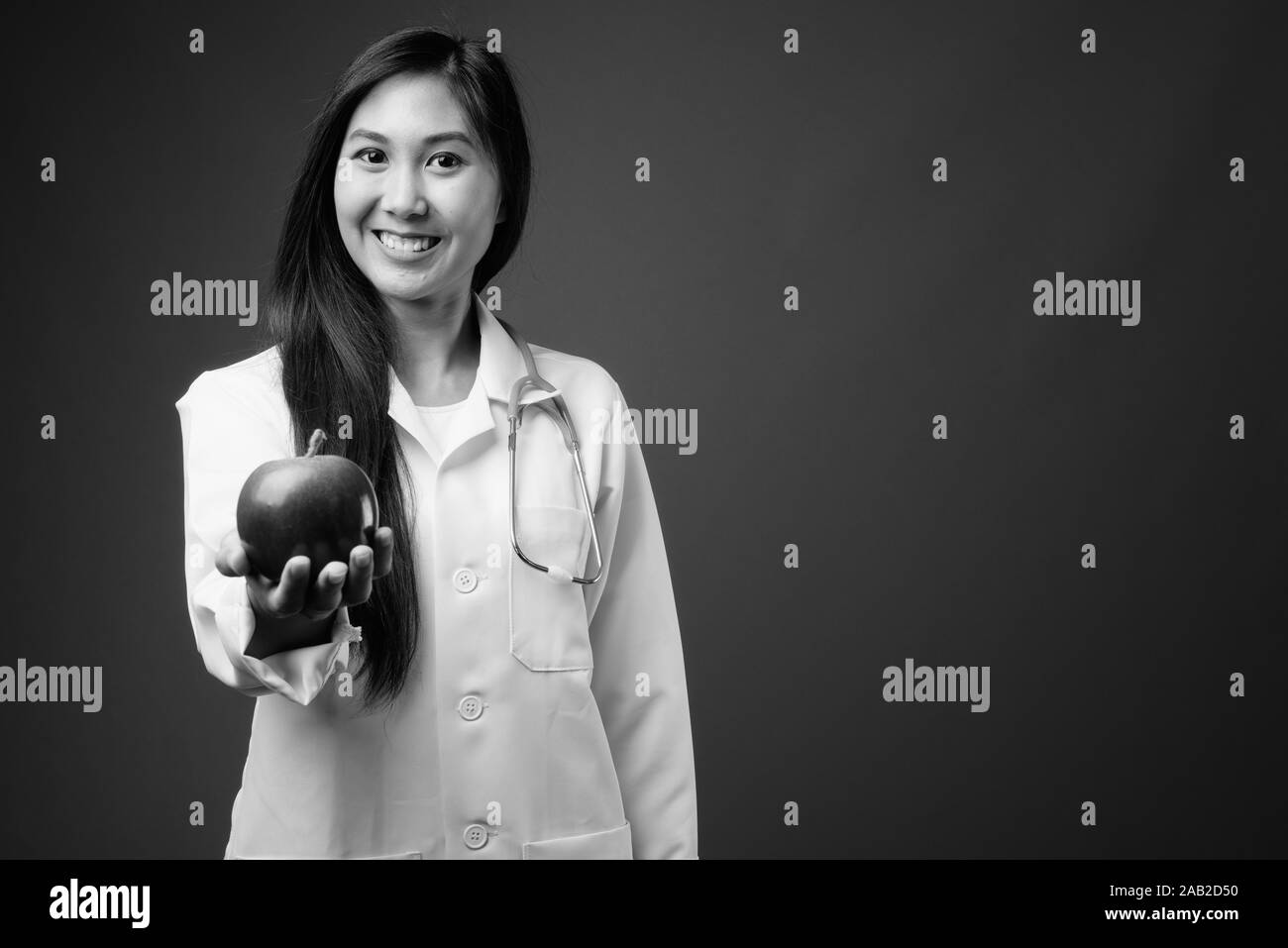 Young beautiful Asian woman doctor in black and white Stock Photo - Alamy