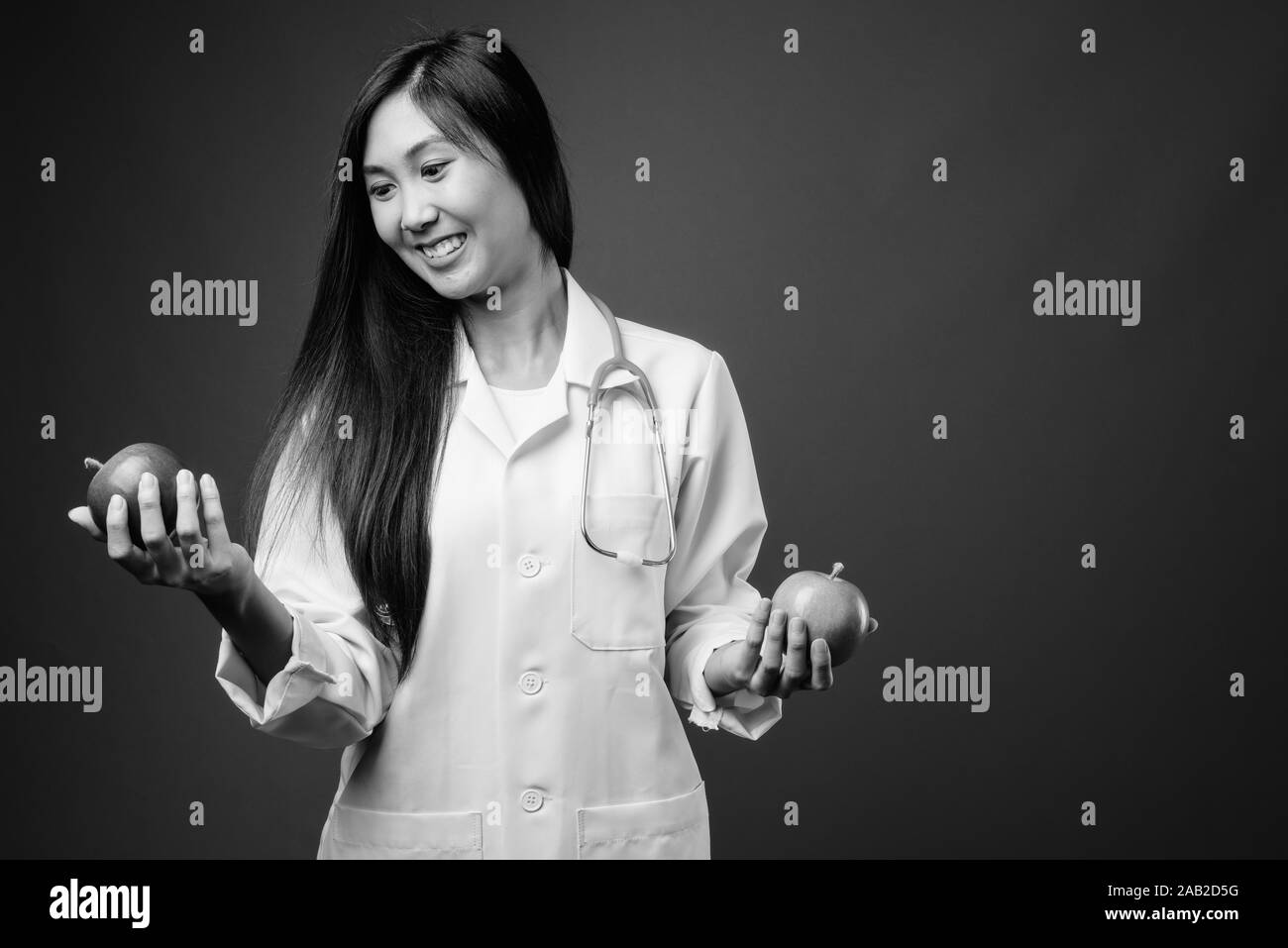 Young beautiful Asian woman doctor in black and white Stock Photo - Alamy