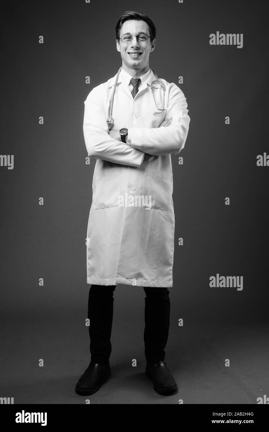 Young confident doctor in white Black and White Stock Photos & Images ...