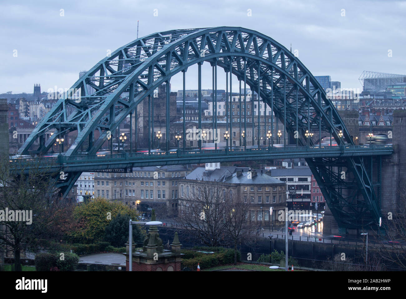 Newcastle upon Tyne, England, UK. 25th November, 2019. Weather: View over the Tyne bridge in Newcastle on a grey, drizzly morning in the north east. Credit: Alan Dawson /Alamy Live News Stock Photo