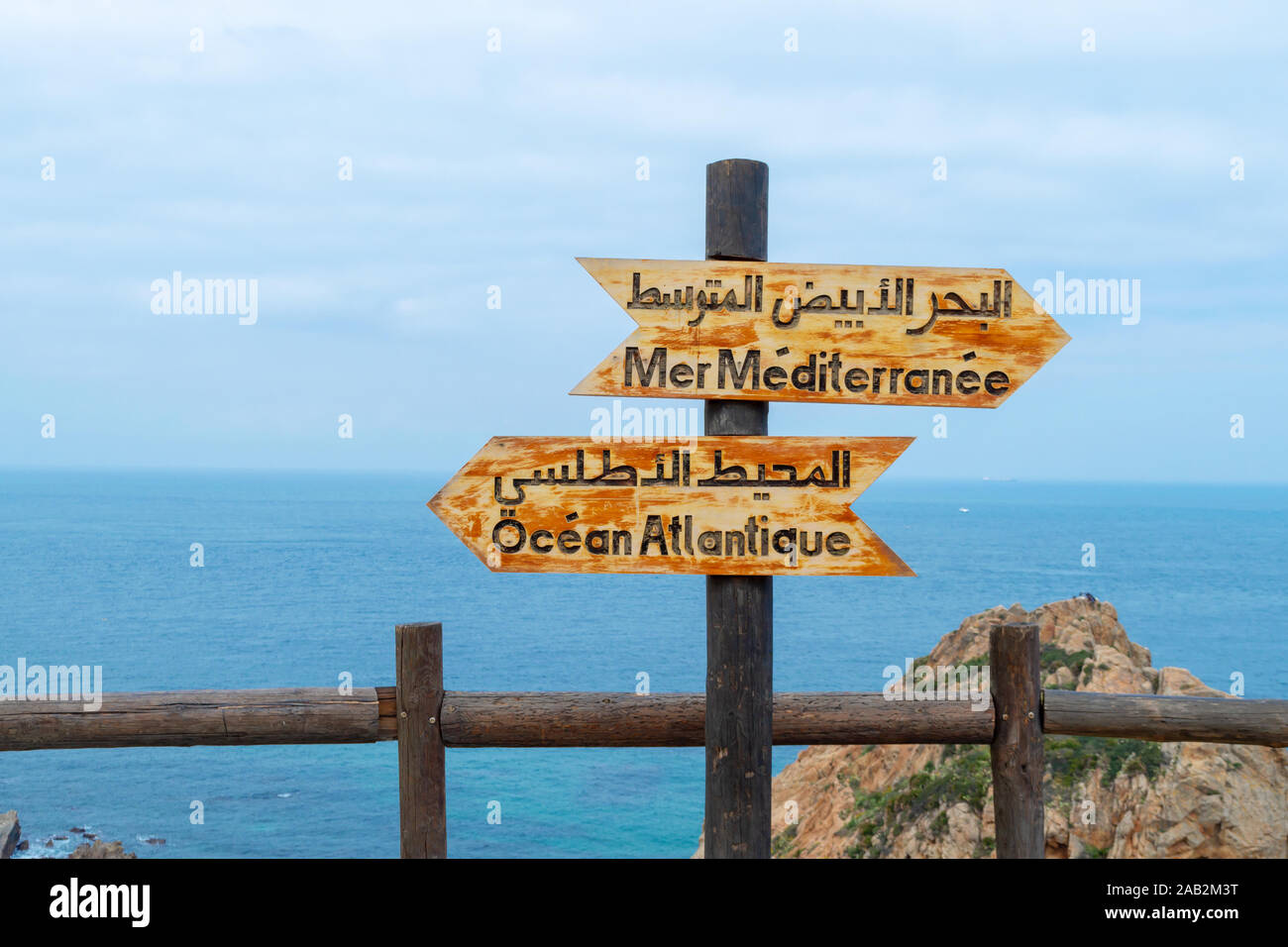 Signs indicating the place where the Atlantic ocean joins the Mediterranean sea near Tangier, Morocco Stock Photo