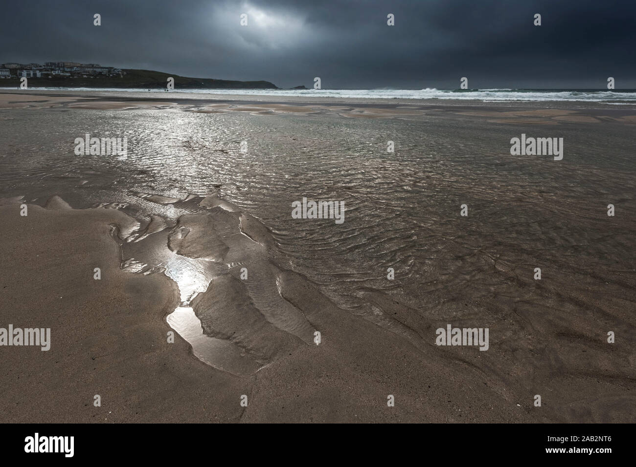 Dark dramatic cloudy sky over Fistral Beach in Newquay in Cornwall. Stock Photo