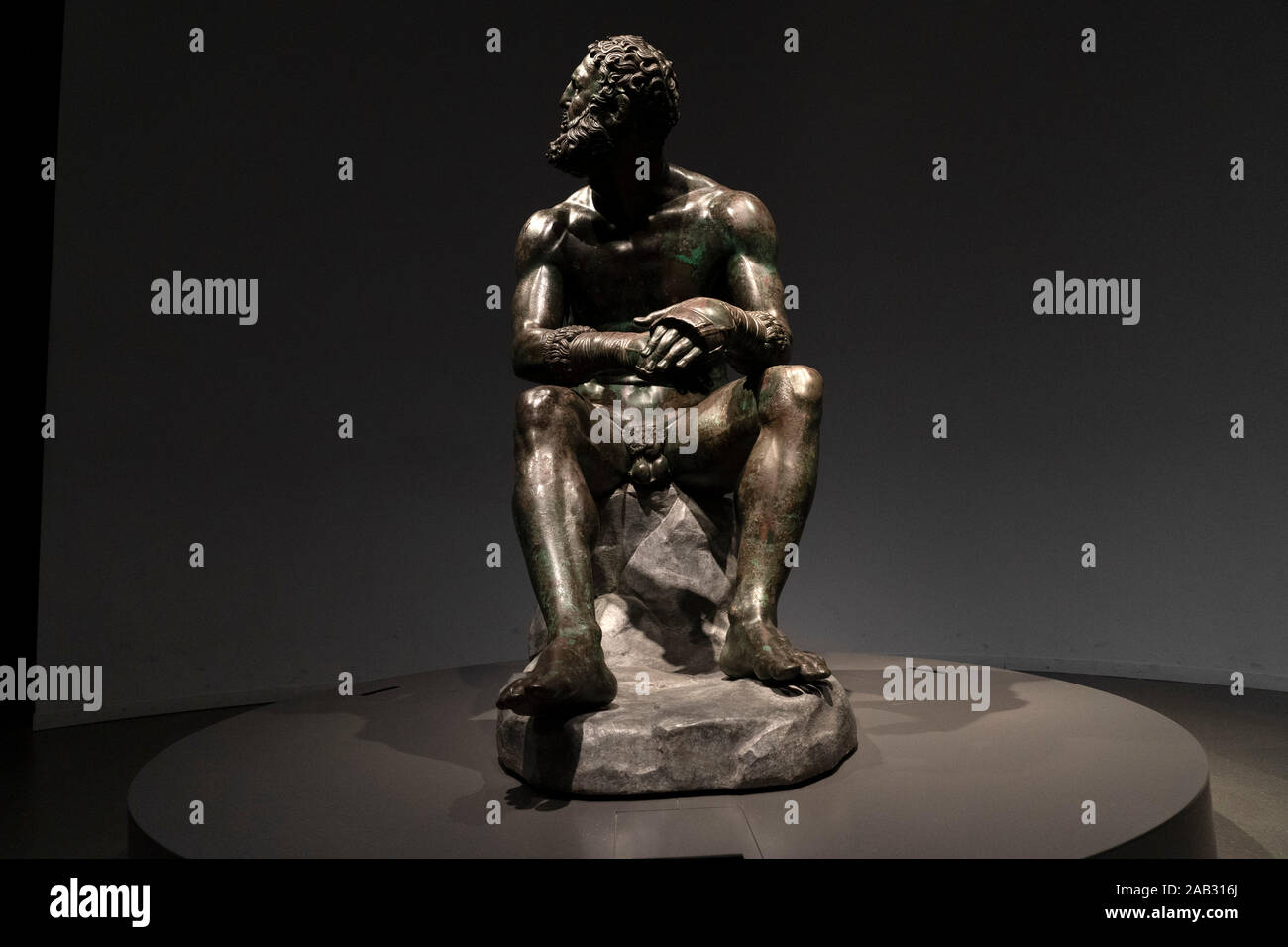 Boxer pugilist greek bronze statue in Rome Stock Photo
