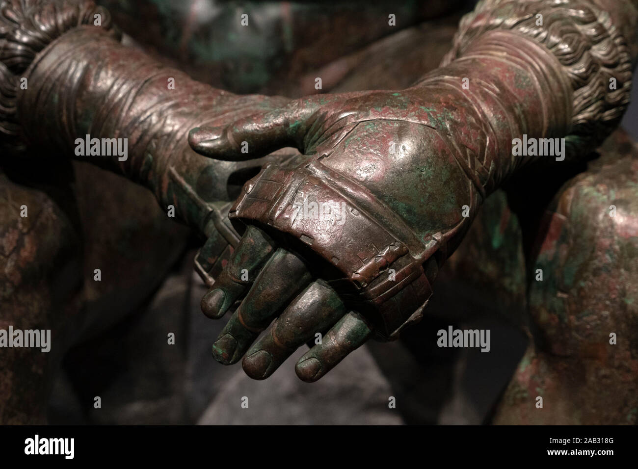 Boxer pugilist greek bronze statue in Rome Stock Photo