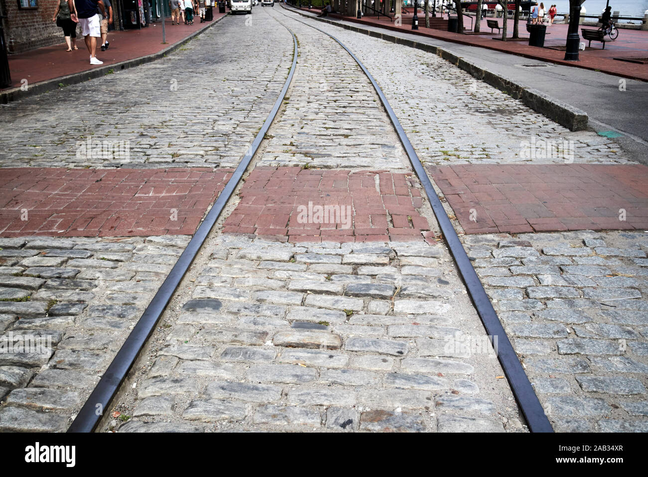 old streetcar rails embedded in the road in river street savannah georgia usa Stock Photo
