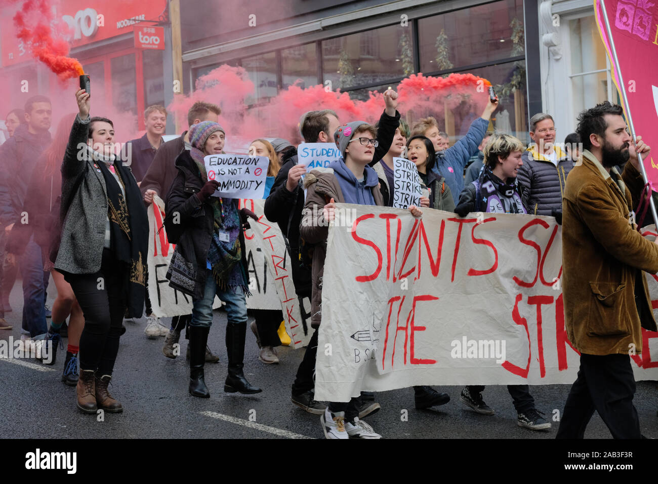 Bristol, UK, 25th November 2019. University lecturers have commenced a series of strikes protesting changes to their Pension Scheme. The University and College Union (UCU) lecturer strike was supported by students and other local groups. A group gathered outside the Victoria Rooms, and after speeches and protests the rally passed peacefully down Park Street and dispersed on College Green. Credit: Mr Standfast/Alamy Live News Stock Photo