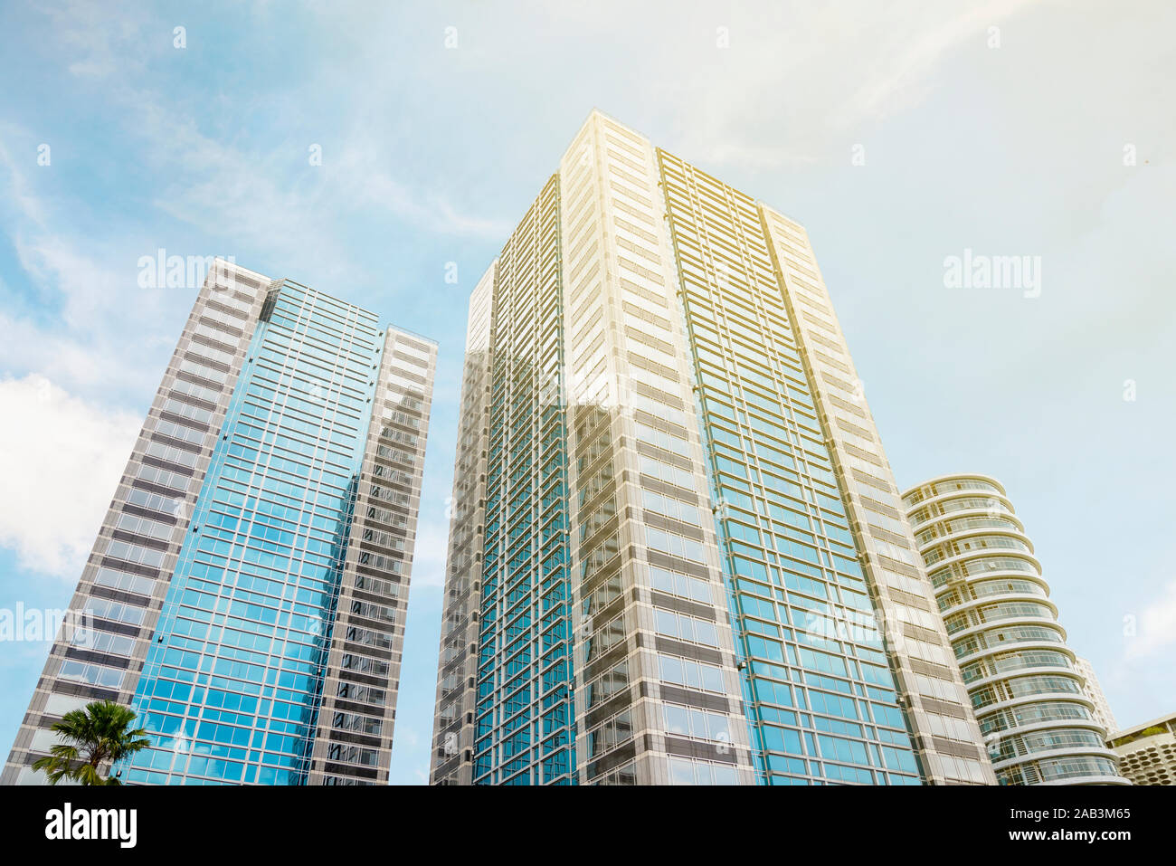 Office building on the city with sunlight and blue sky background Stock ...