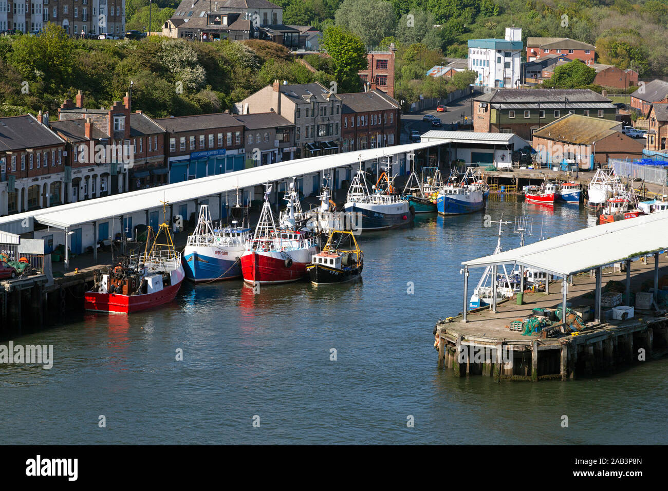 Fishing boats docked at North Shields, England. They boats deliver their catch to North Shields Fish Market. Stock Photo