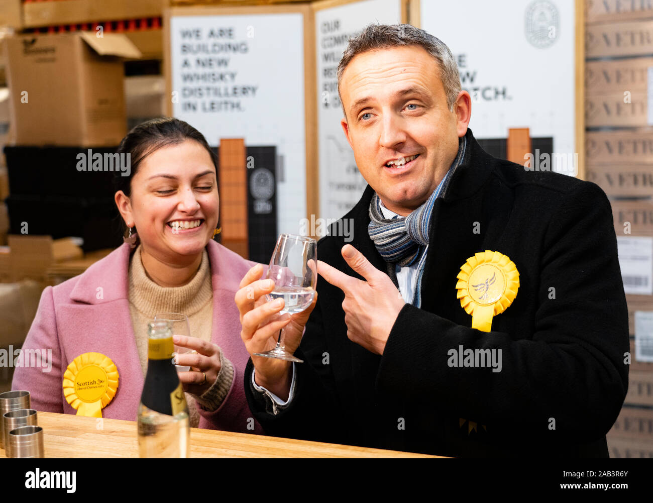 Leith, Scotland, UK. 25th November 2019. Scottish Liberal Democrat campaign chair Alex Cole-Hamilton and Rebecca Bell Liberal parliamentary candidate for Dunfermline and West Fife visited Port of Leith Distillery and outlined the party’s plans to target new ground such as Edinburgh North and Leith, as well as recapturing the party’s traditional Scottish heartlands in the snap general election. Iain Masterton/Alamy Live News. Stock Photo