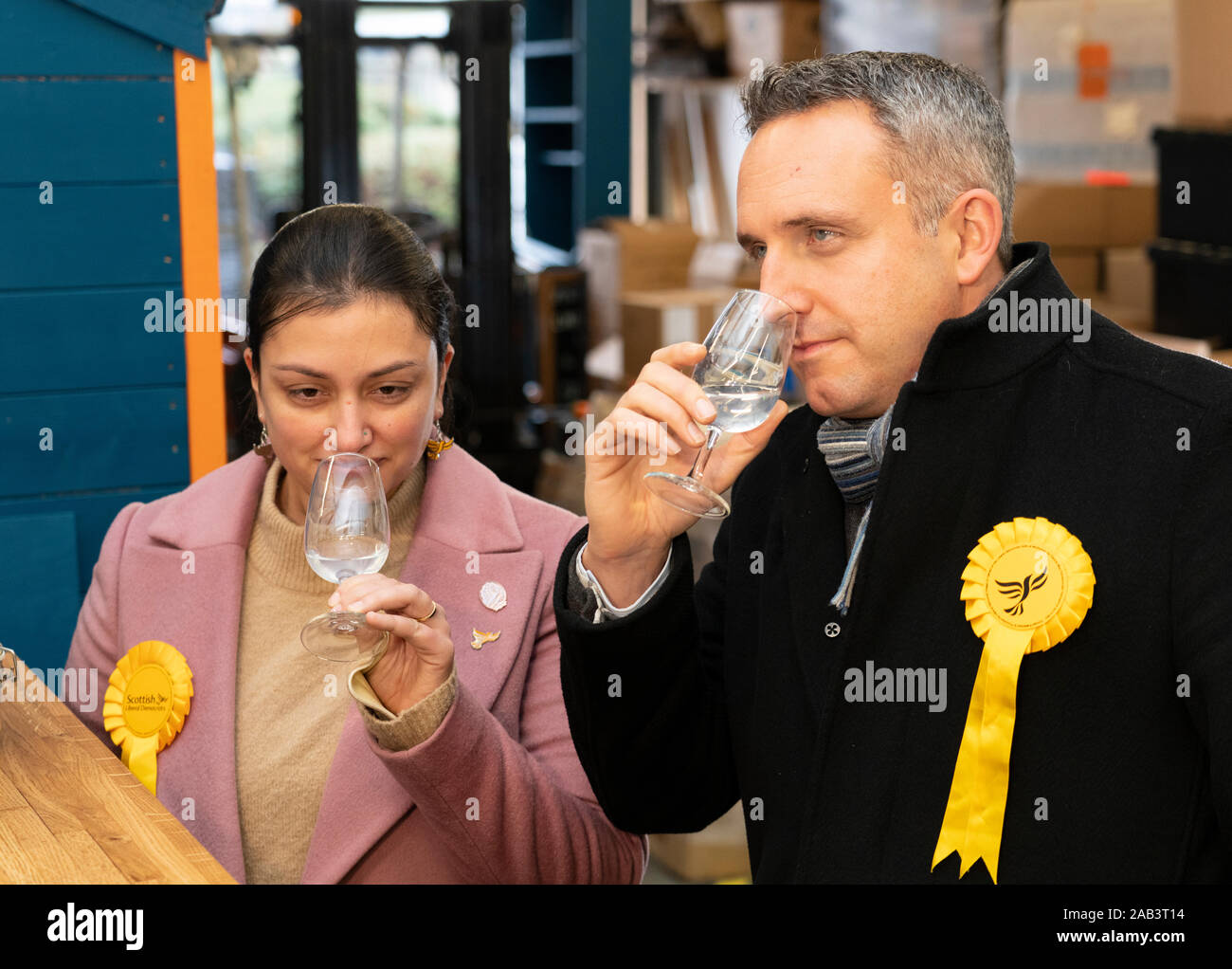 Leith, Scotland, UK. 25th November 2019. Scottish Liberal Democrat campaign chair Alex Cole-Hamilton and Rebecca Bell Liberal parliamentary candidate for Dunfermline and West Fife visited Port of Leith Distillery and outlined the party’s plans to target new ground such as Edinburgh North and Leith, as well as recapturing the party’s traditional Scottish heartlands in the snap general election. Iain Masterton/Alamy Live News. Stock Photo