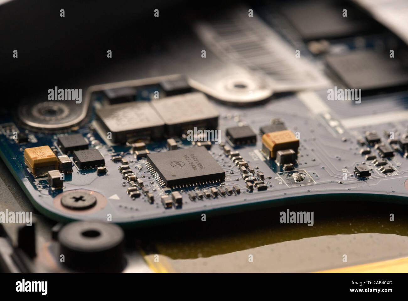 inside of a laptop showing the many small components that make the system work correctly Stock Photo