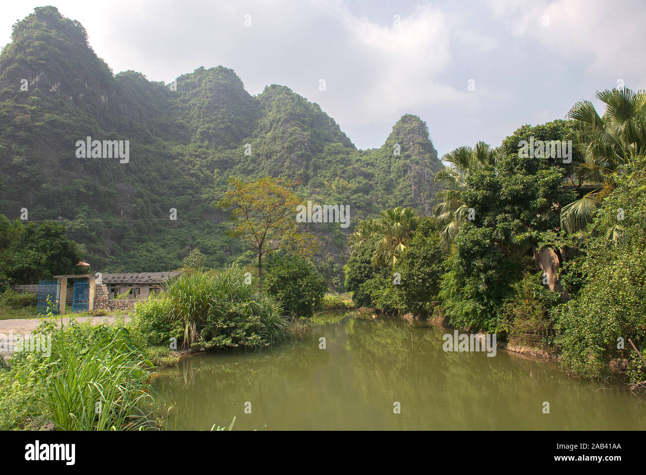 Panoramic view of karst formations in Tam Coc, a part of Trang An Complex , was  declared a UNESCO World Heritage Stock Photo