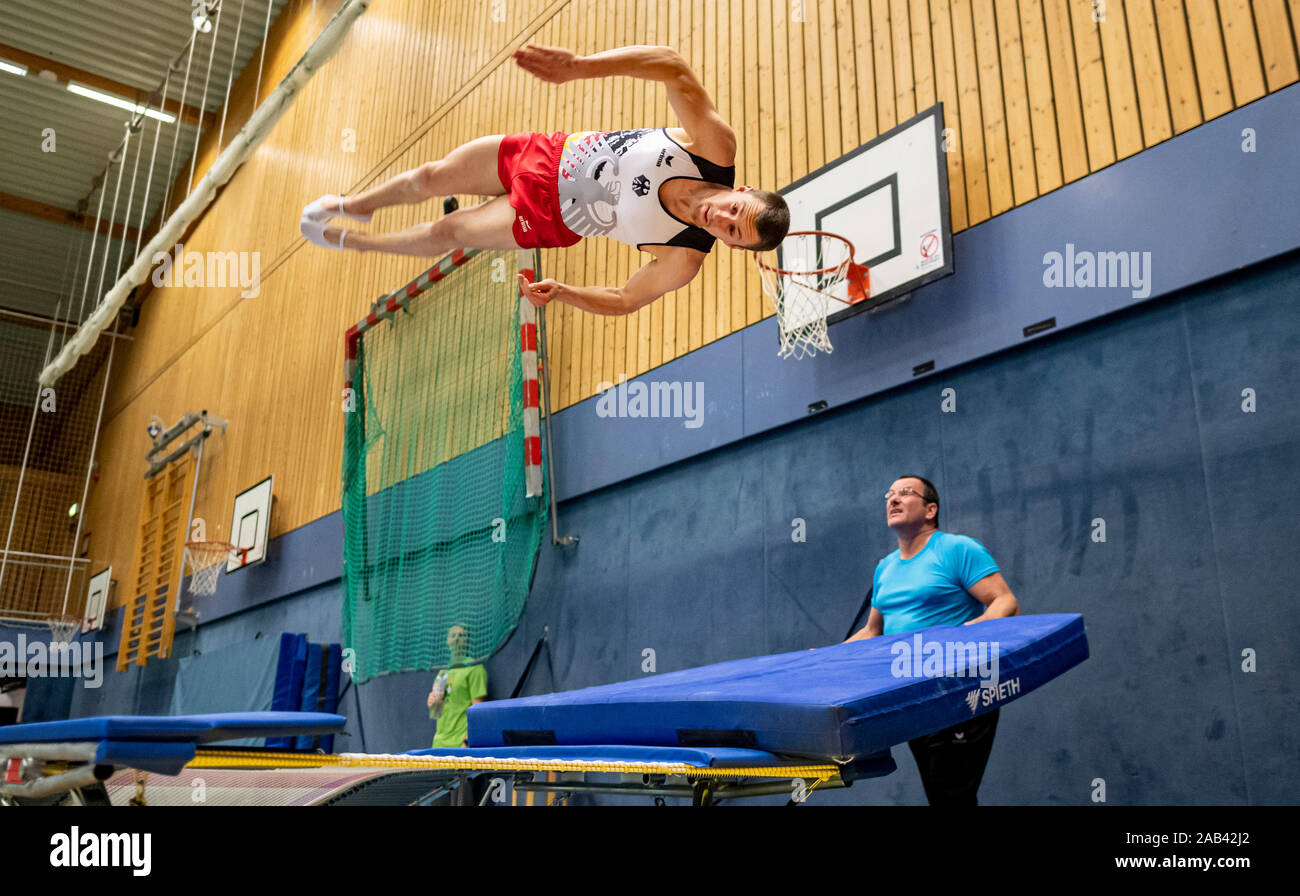 Hamburg, Germany. 20th Nov, 2019. Trampolining gymnast Daniel Schmidt  trains together with his trainer and father Olaf (r) in the Margaretha  Rothe Gymnasium for the World Championships. For trampoline gymnast Daniel  Schmidt,
