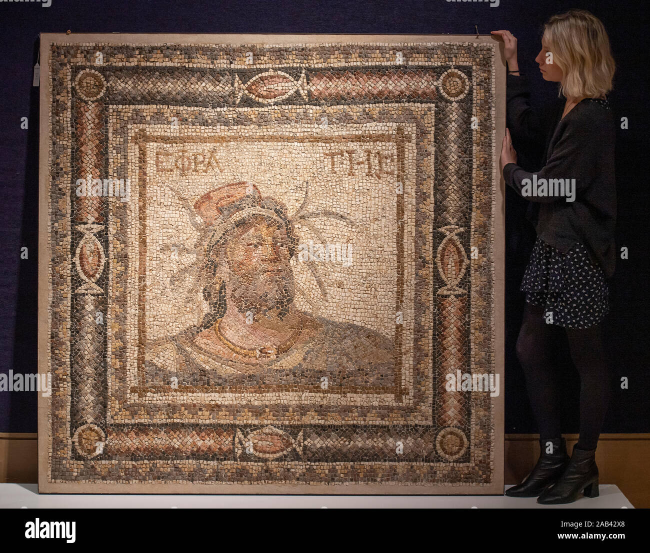 Bonhams, London, UK. 25th November 2019. The Antiquities Sale. A Roman marble mosaic panel with a representation of the Euphrates, estimate £30,000-40,000. Credit: Malcolm Park/Alamy Live News. Stock Photo