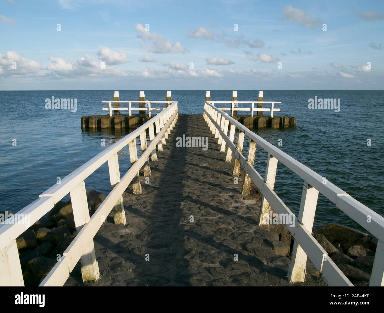 Jetty at the Ijsselmeer on the Afsluitdijk A7, the Netherlands. Stock Photo