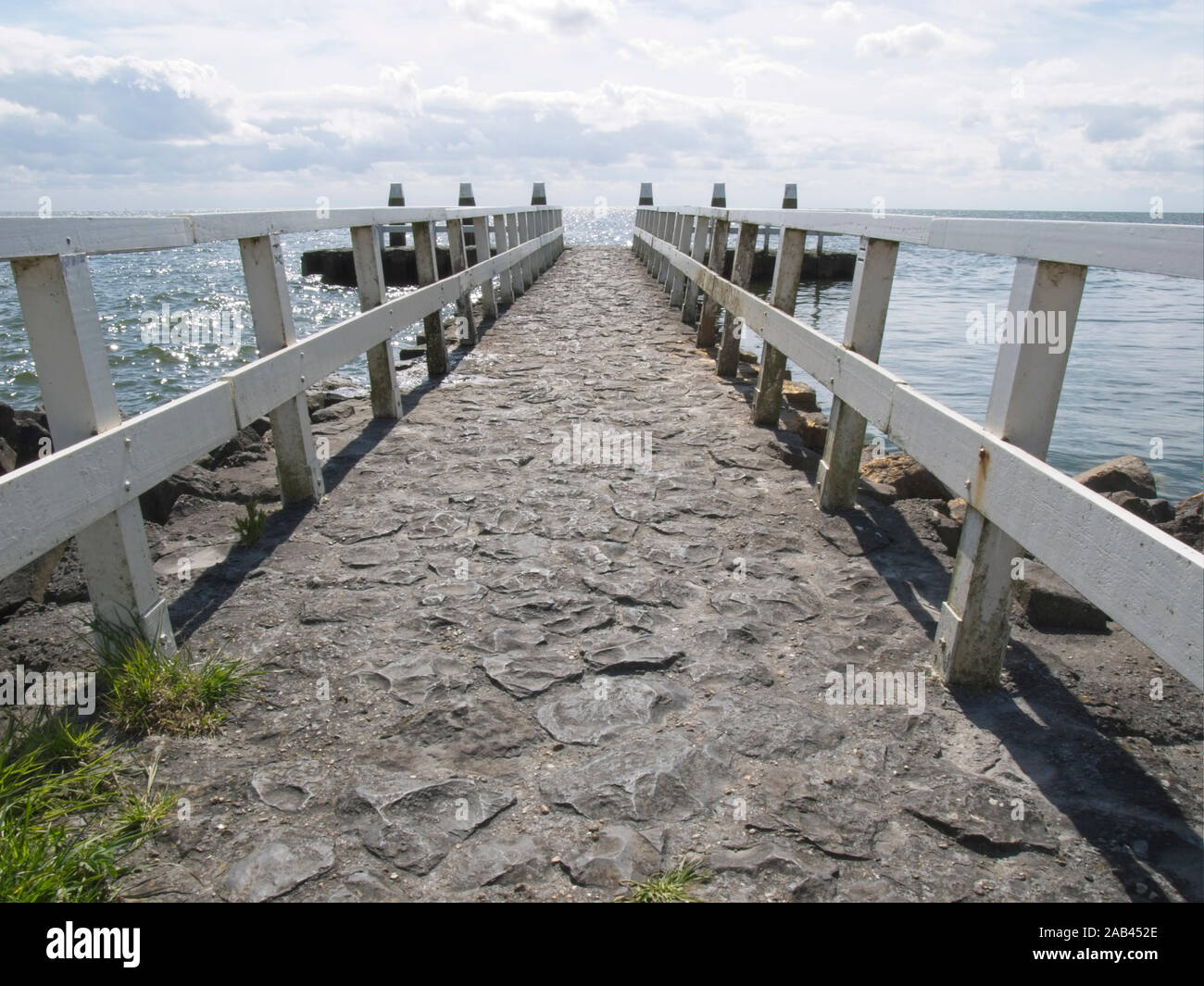 Jetty at the Ijsselmeer on the Afsluitdijk A7, the Netherlands. Stock Photo