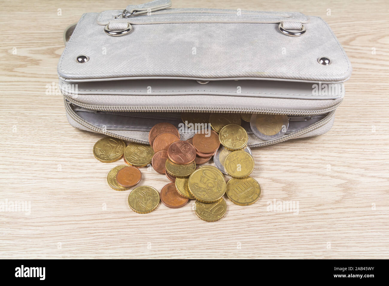 Euros coins take out of a gray purse Stock Photo