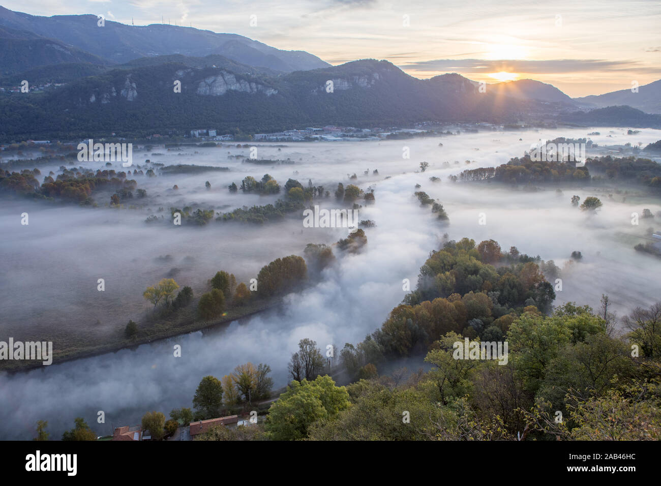 Adda river valley in the fog, Airuno, Lombardy, Italy Stock Photo