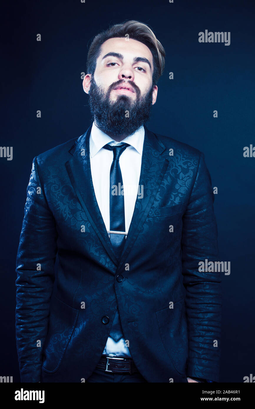 Young Pretty Modern Hipster Business Man With Beard Standing On