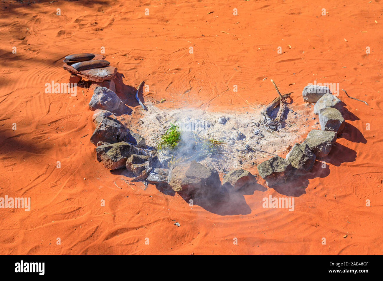 Traditional stone and bush plants used during the smoking ceremony among Indigenous Australians