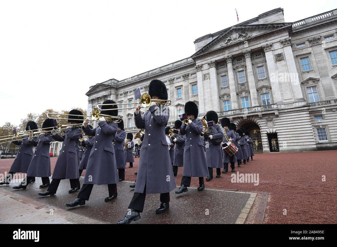 Band of the Grenadier Guards exit the forecourt, as sailors from the Royal Navy perform the Changing of the Guard ceremony at Buckingham Palace, London, for the second time in its 357-year history. Stock Photo