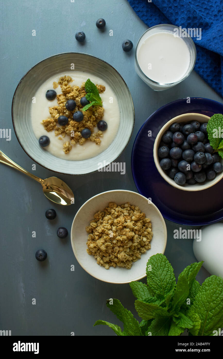 Food photography of breakfast consisting of yogurt, granola cereal and