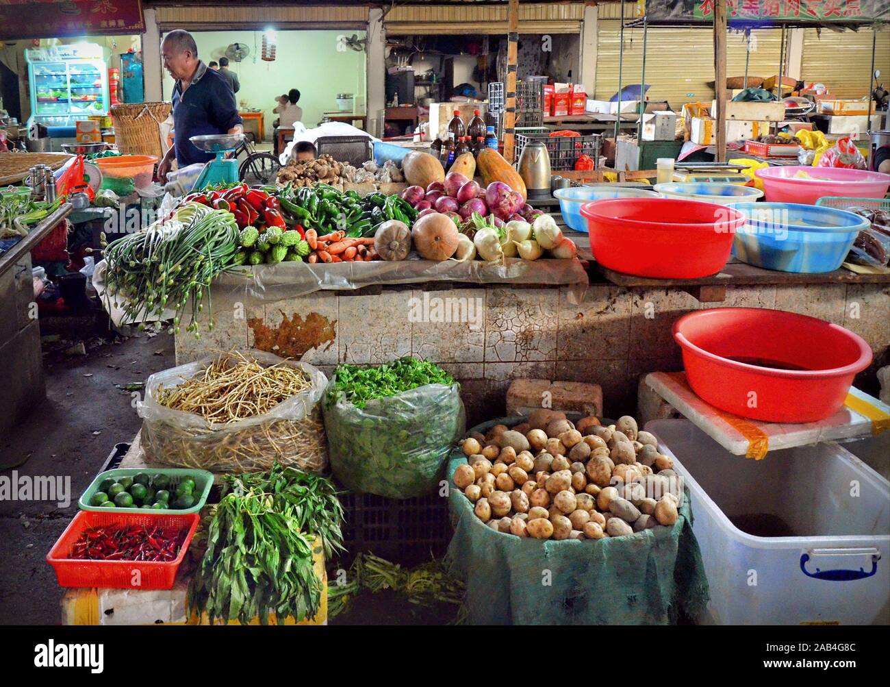 Local food market in Nujiang valley, Yunnan province, China Stock Photo ...