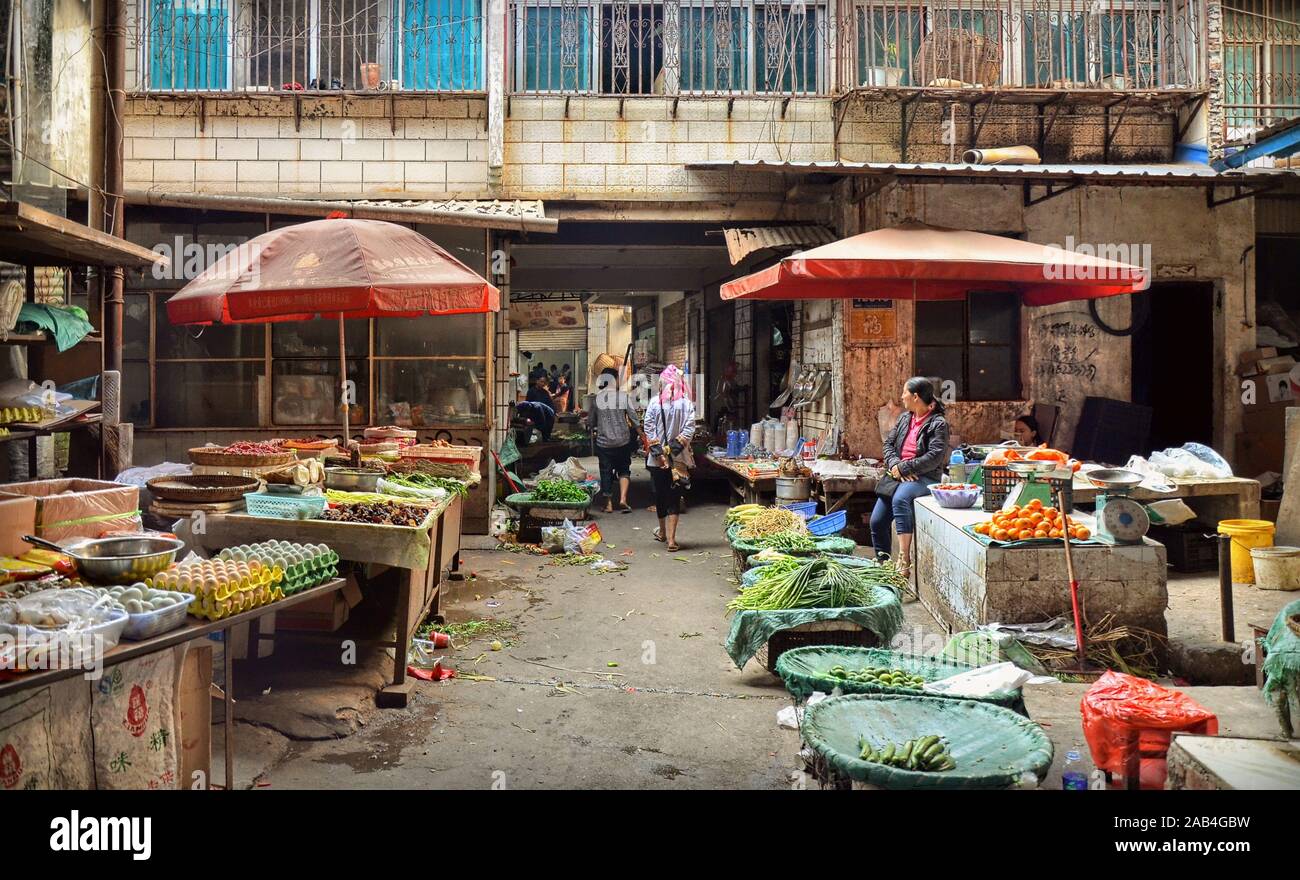Local food market in Nujiang valley, Yunnan province, China Stock Photo ...