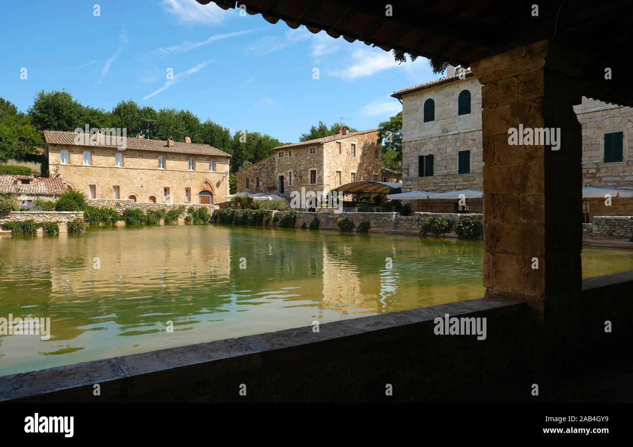 The ancient thermal bath village square of Bagno Vignoni in Val d'Orcia in Tuscany Italy - Baths of St. Catherine Stock Photo