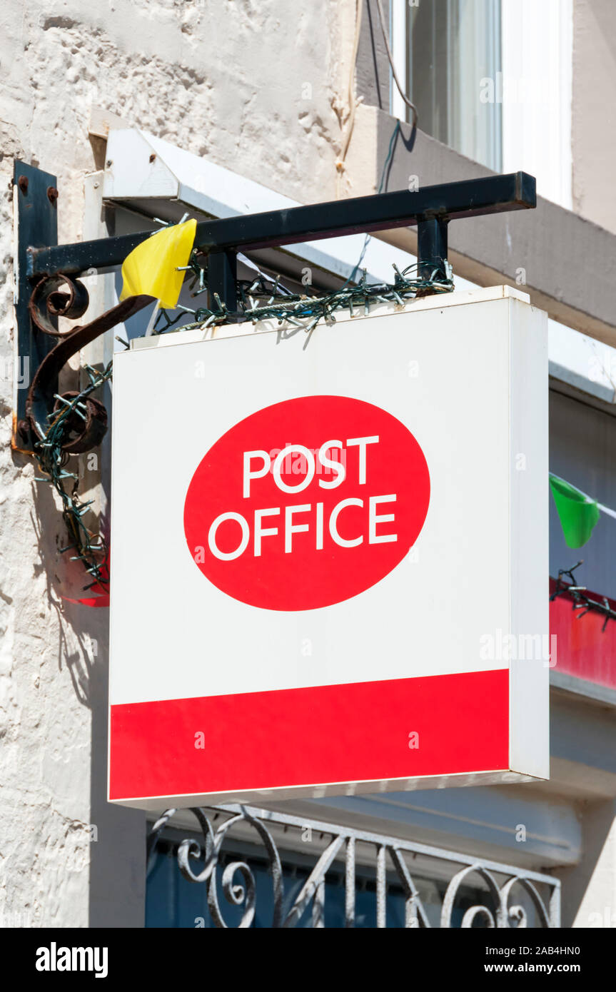 A sign outside a UK village post office. Stock Photo