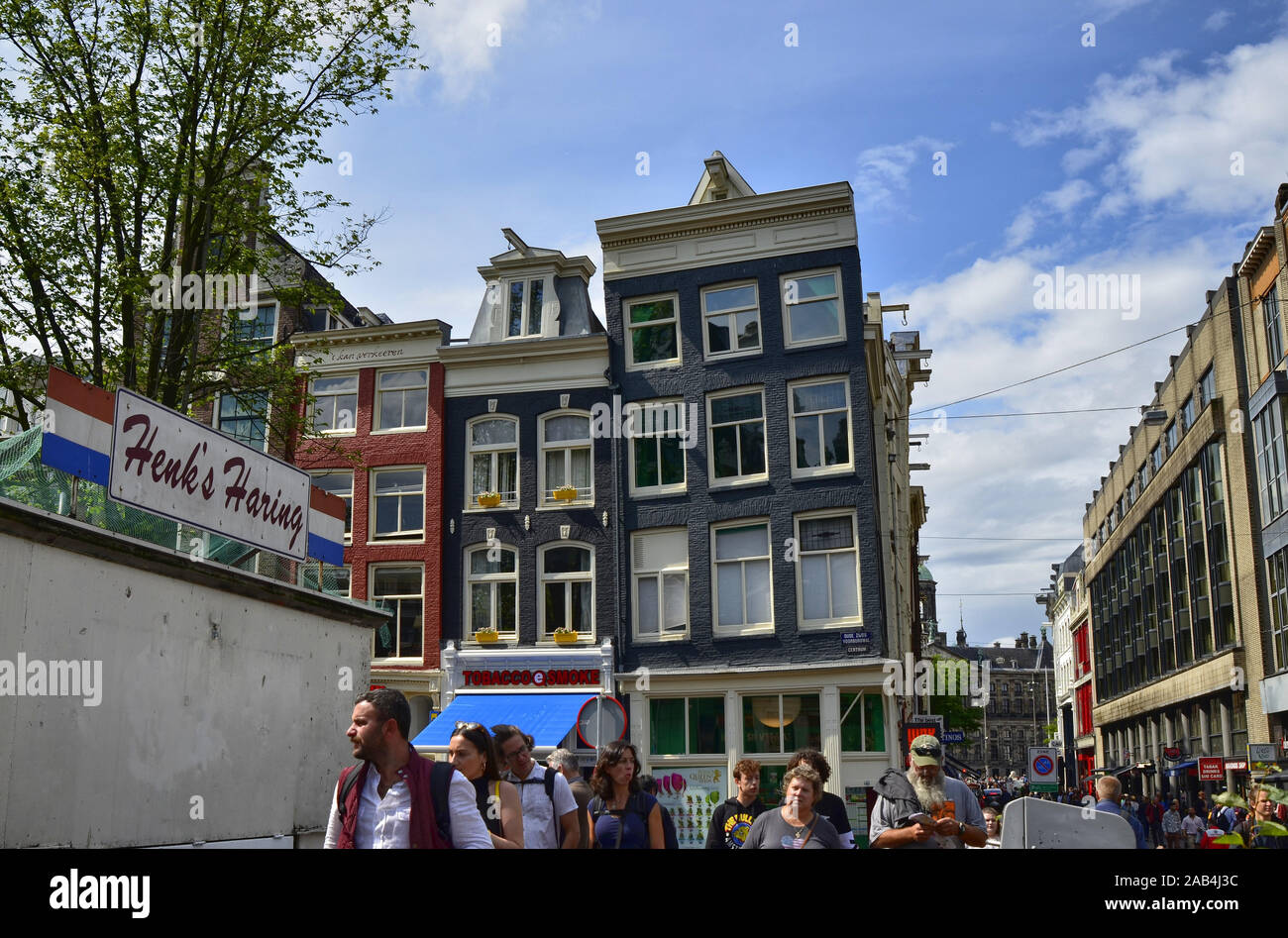 Amsterdam, Holland. August 2019. On the left the sign of a herring