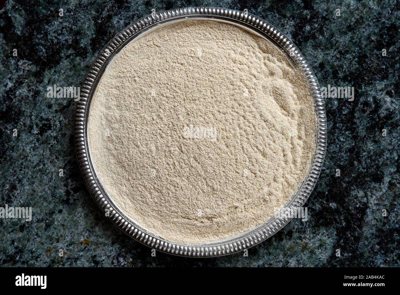 Winter cherry powder (Withania somnifera), , powder in a bowl