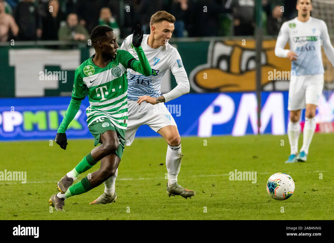 BUDAPEST, HUNGARY - AUGUST 29: (l-r) Tokmac Chol Nguen of Ferencvarosi TC  celebrates his goal in front of Gergo Lovrencsics of Ferencvarosi TC during  the UEFA Europa League Play-off Second Leg match