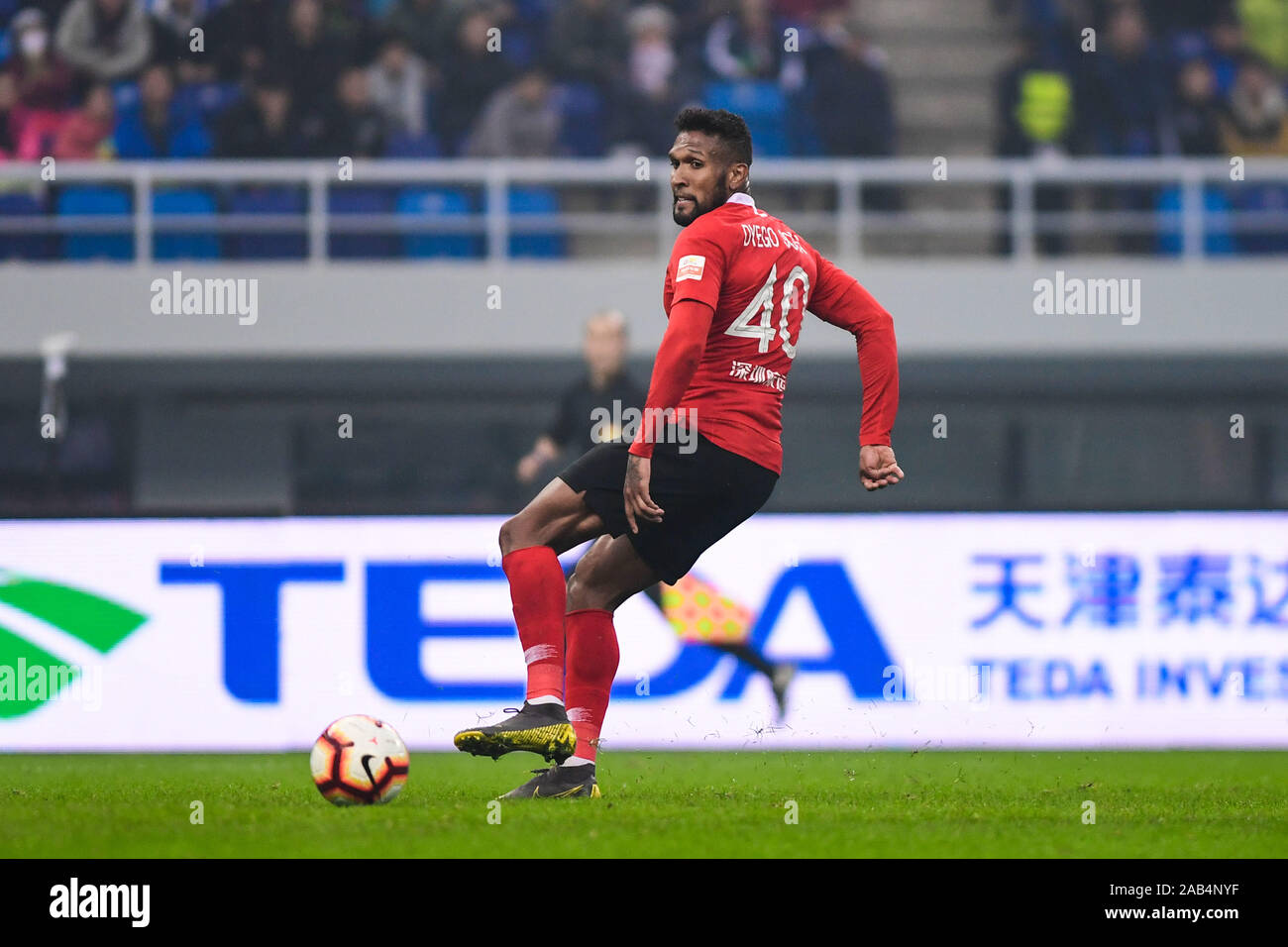 Brazilian-born Portuguese football player Dyego Sousa of Shenzhen F.C. keeps the ball during the 28th round match of Chinese Football Association Super League (CSL) against Tianjin TEDA in Tianjin, China, 23 November 2019. Tianjin TEDA slashed Shenzhen F.C. with 3-0. Stock Photo