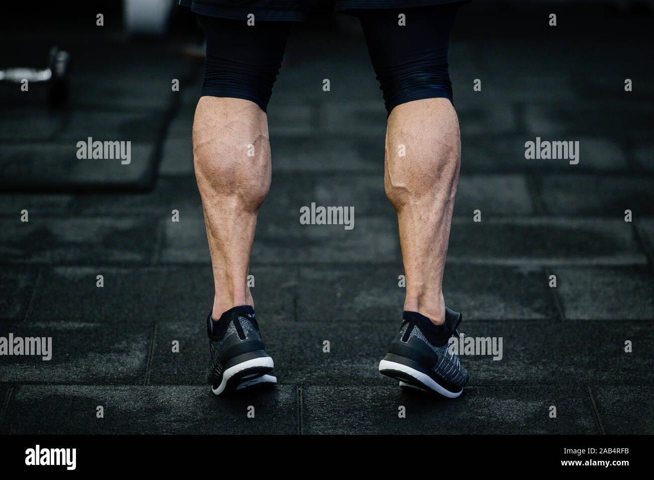 Muscular man calves hires stock photography and images Alamy