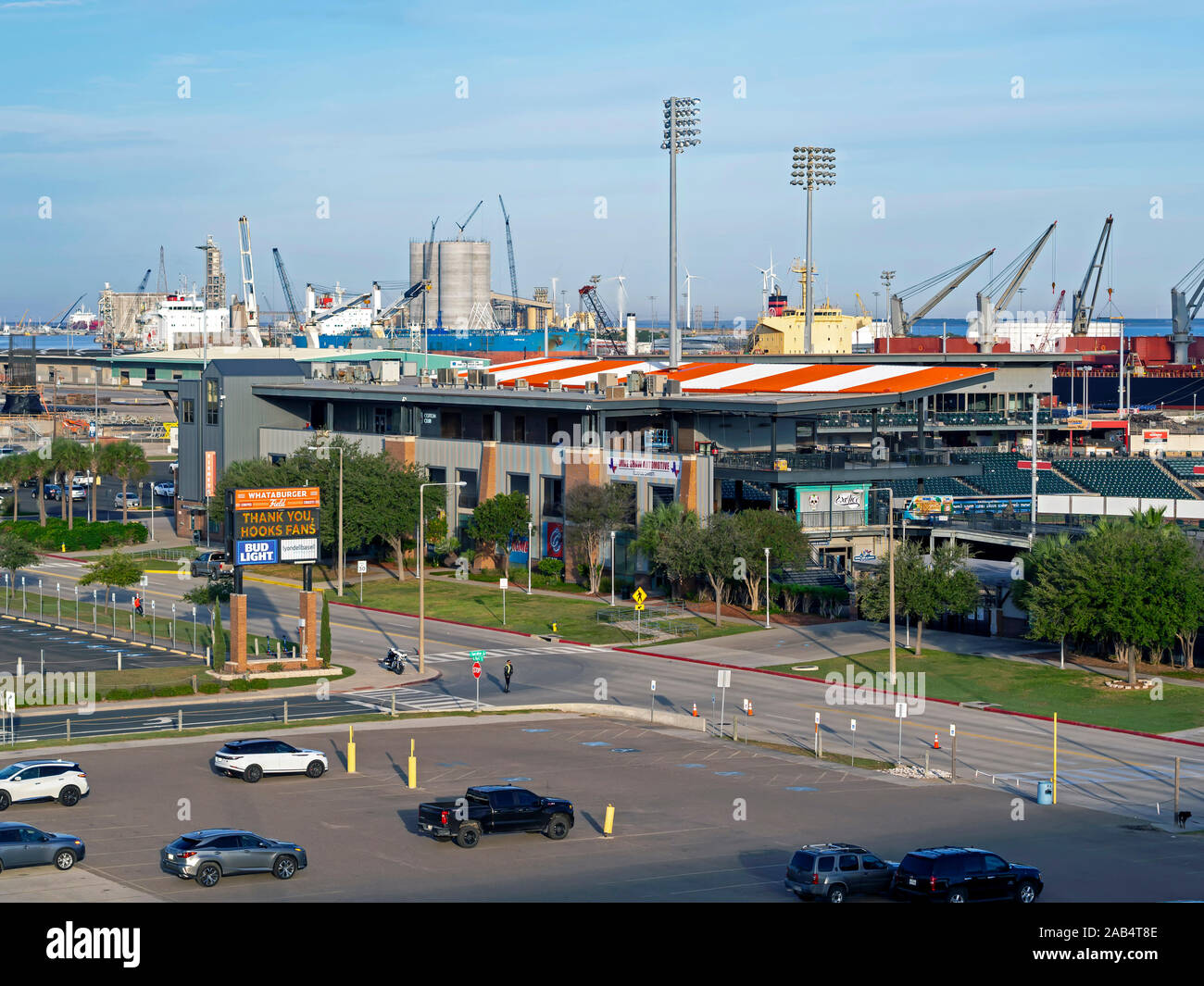Elevated view the Whataburger Field baseball venue in Corpus Christi, Texas USA with the Port of Corpus Christi in the background. Stock Photo