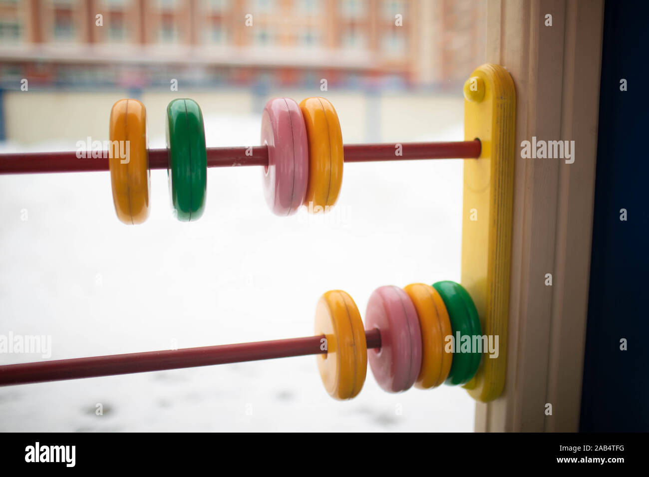 Children's abacus on the children's outdoor Playground. Close up. Stock Photo