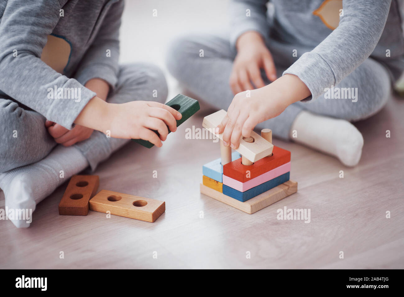 Children Play With A Toy Designer On The Floor Of The Children S