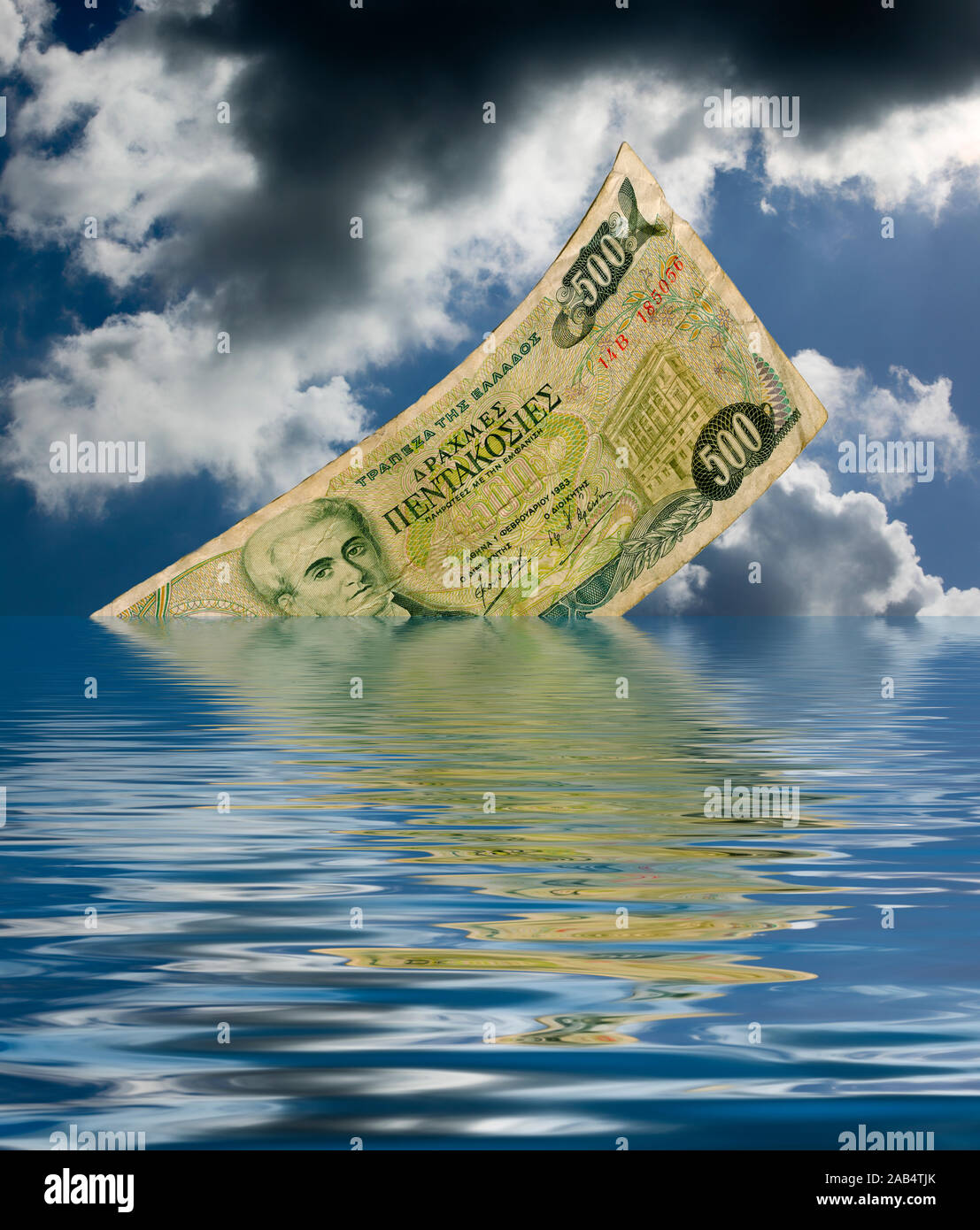 A Greek 500 Drachmas note is sinking in the ocean Stock Photo