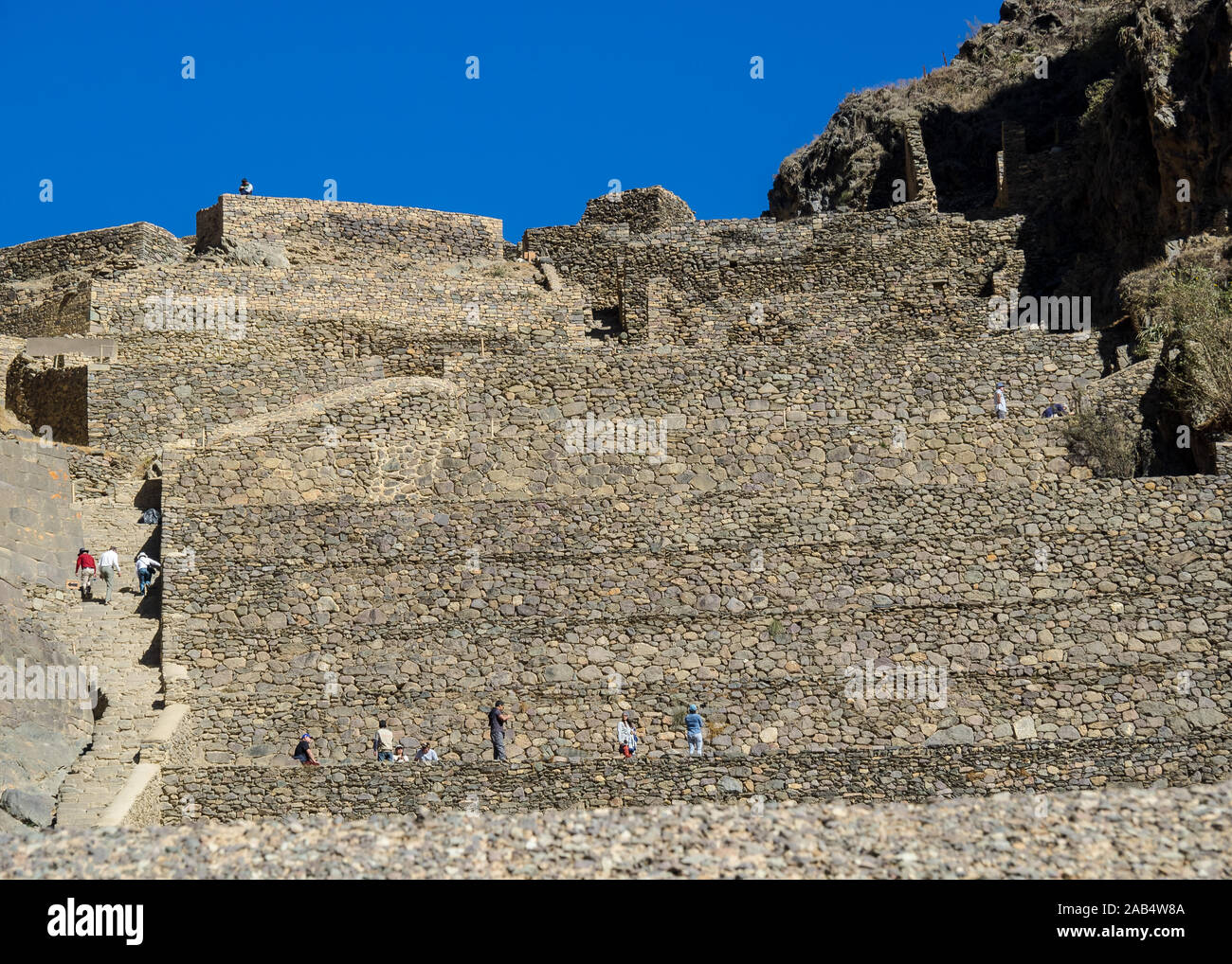 Ollantaytambo ruins, a massive Inca fortress with large stone terraces on a hillside Stock Photo