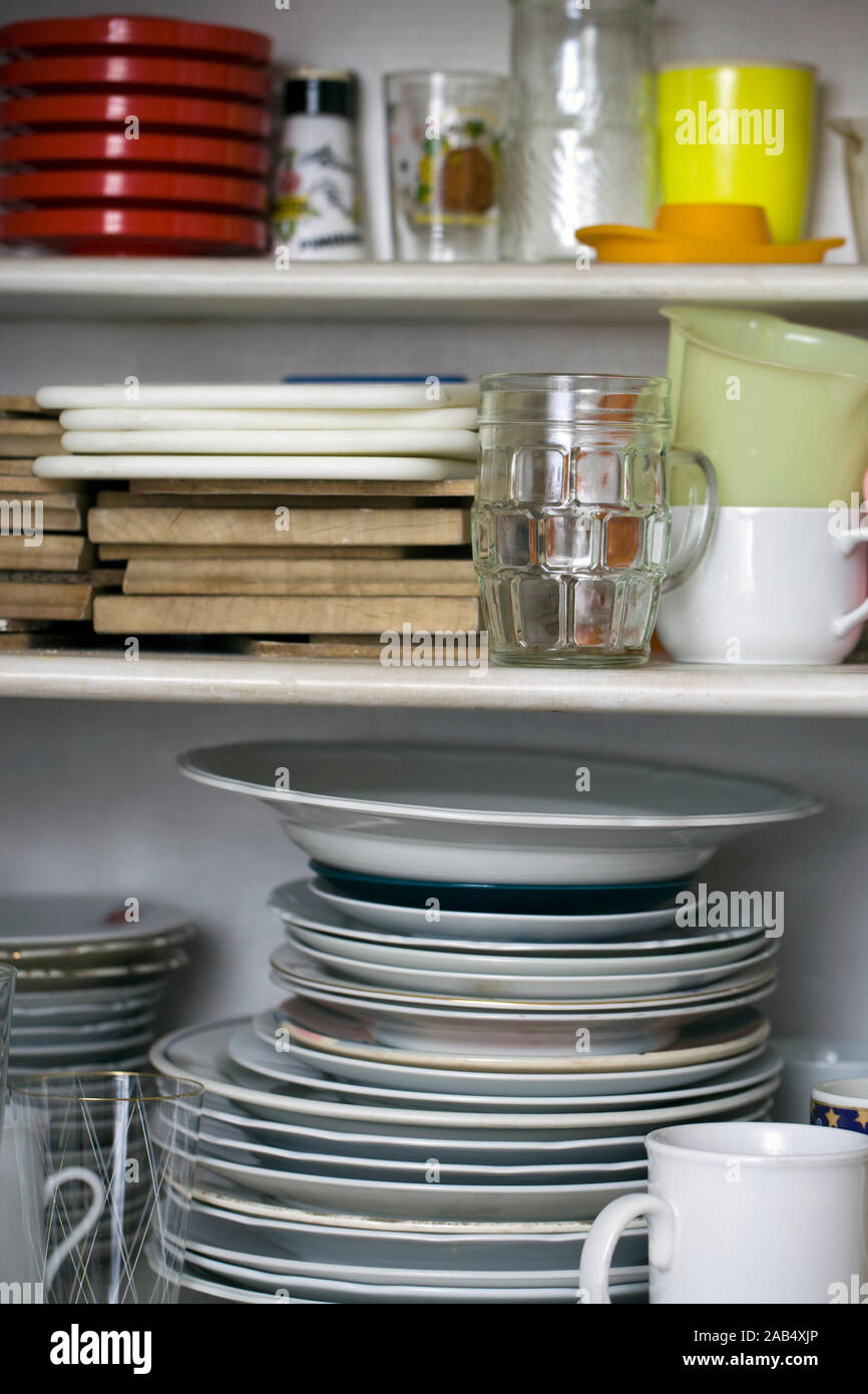 Chaotic inside of a kitchen cupboard Stock Photo