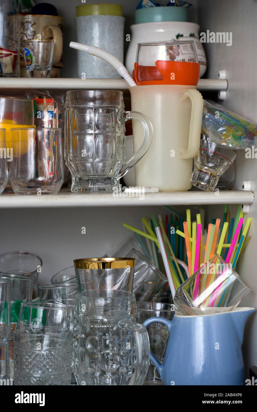 Chaotic inside of a kitchen cupboard Stock Photo
