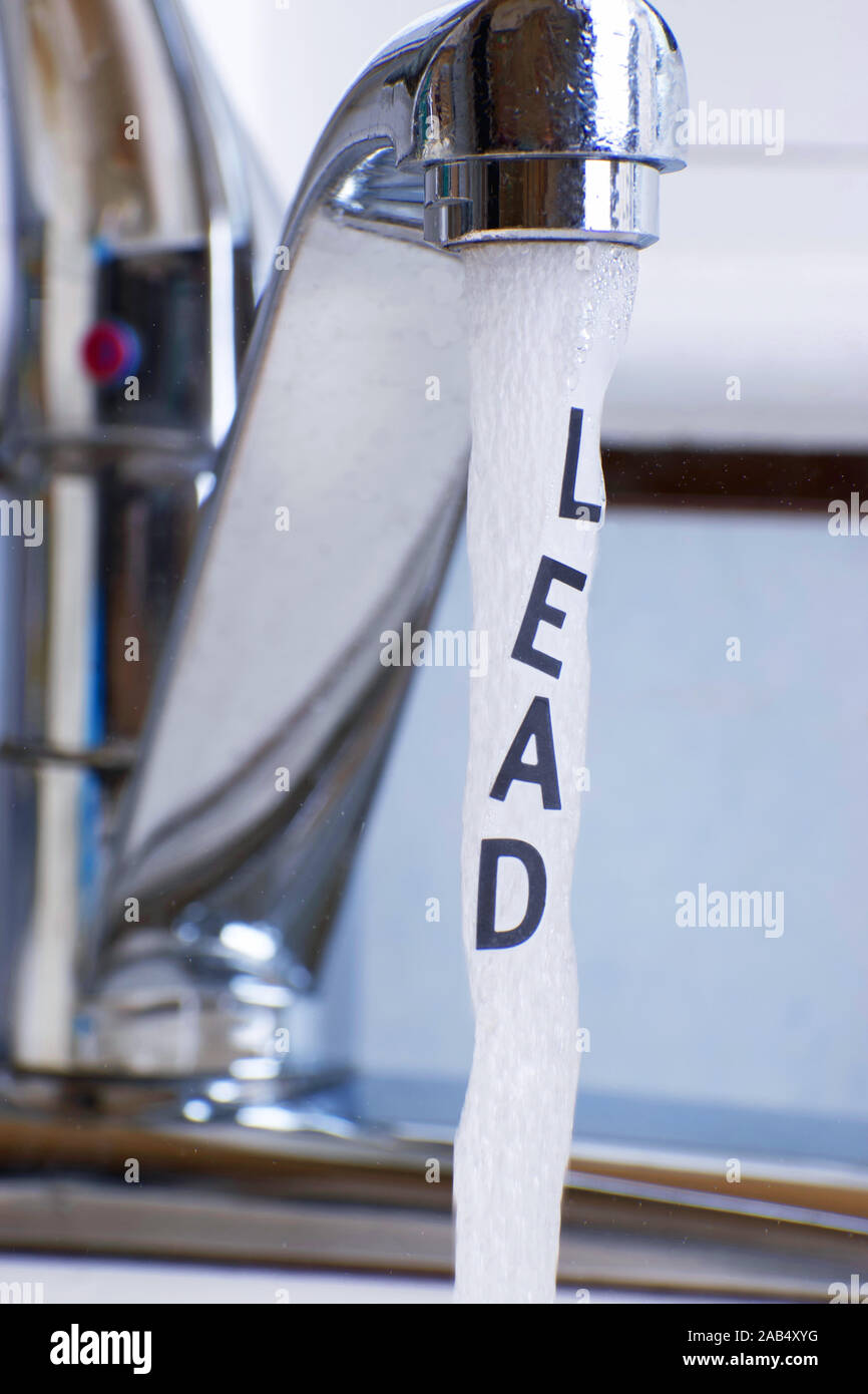 Lead In Running Tap or City Water, Lettering saying LEAD" is in the running water stream Stock