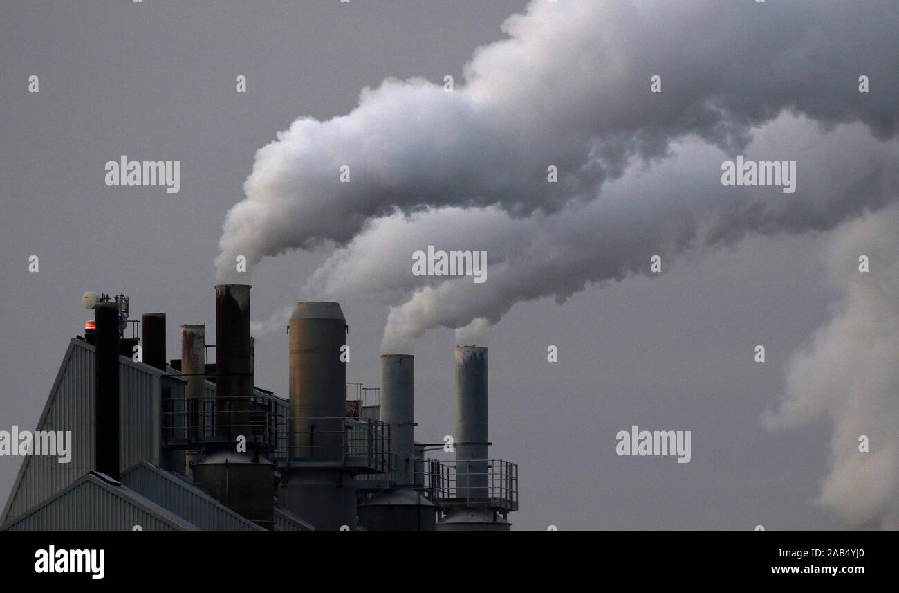 Smoke billows from factory chimneys, Lincolnshire, UK Stock Photo