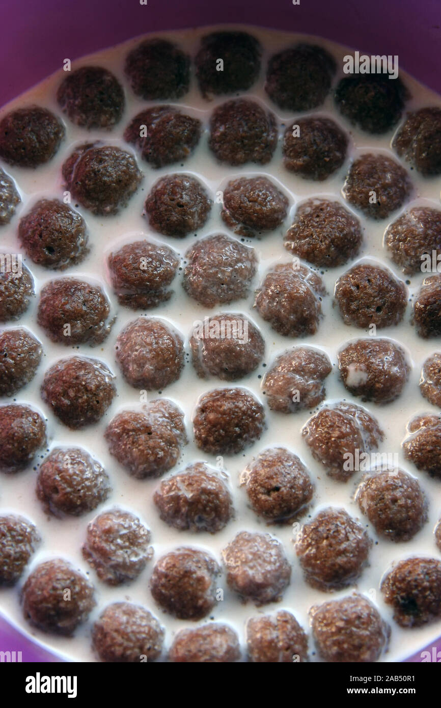 Chocolate balls. Chocolate serials. Kids healthy breakfast Stock Photo