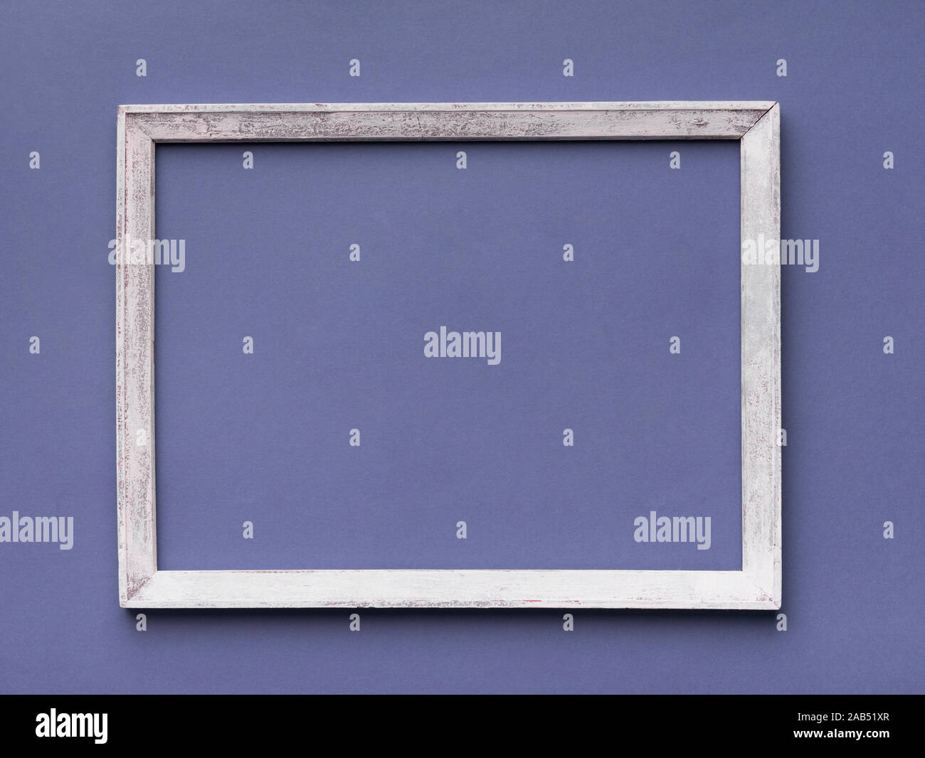 Empty frame with wooden border on gray background Stock Photo
