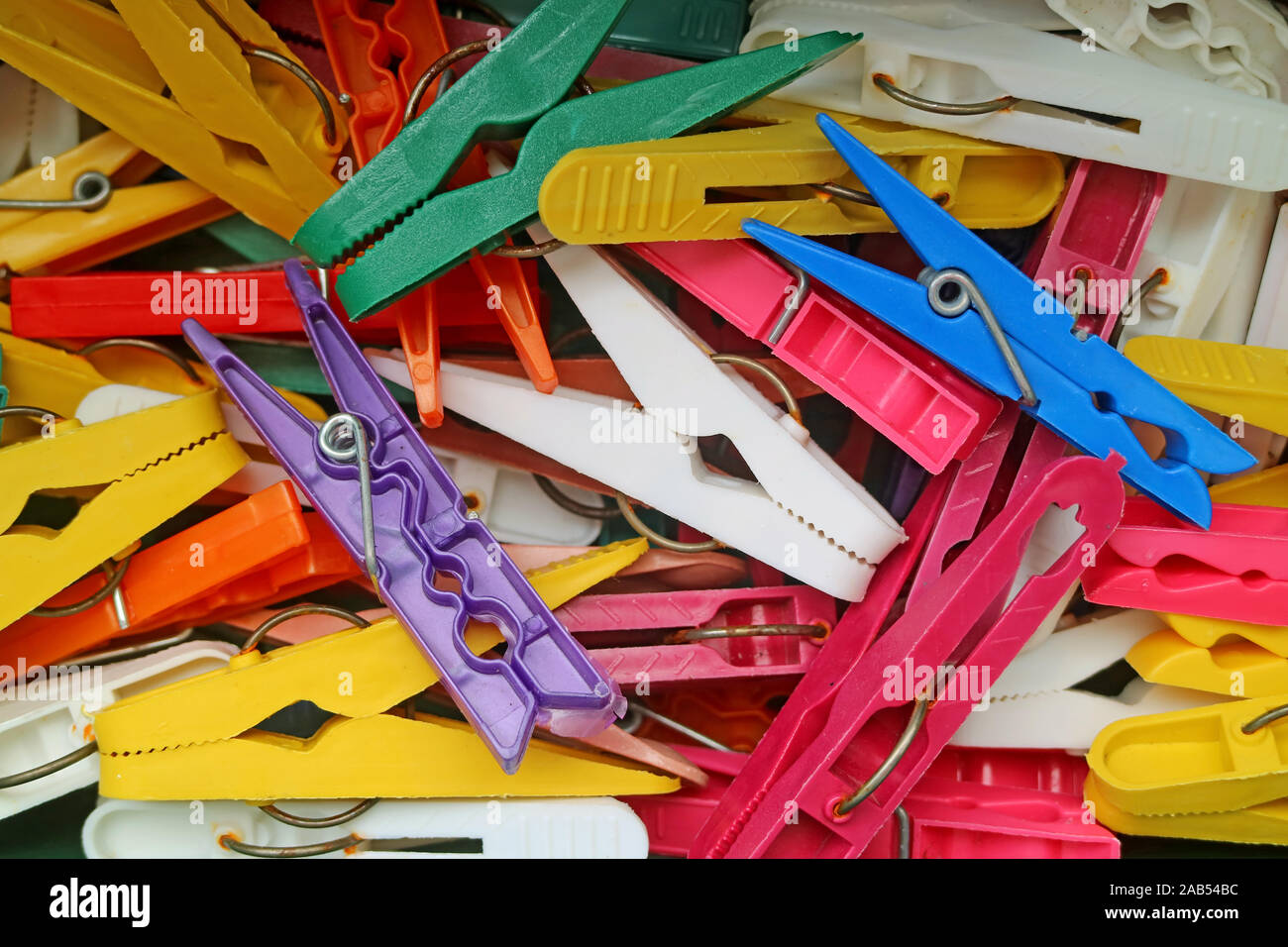 Top view of heap of colorful clothespins Stock Photo