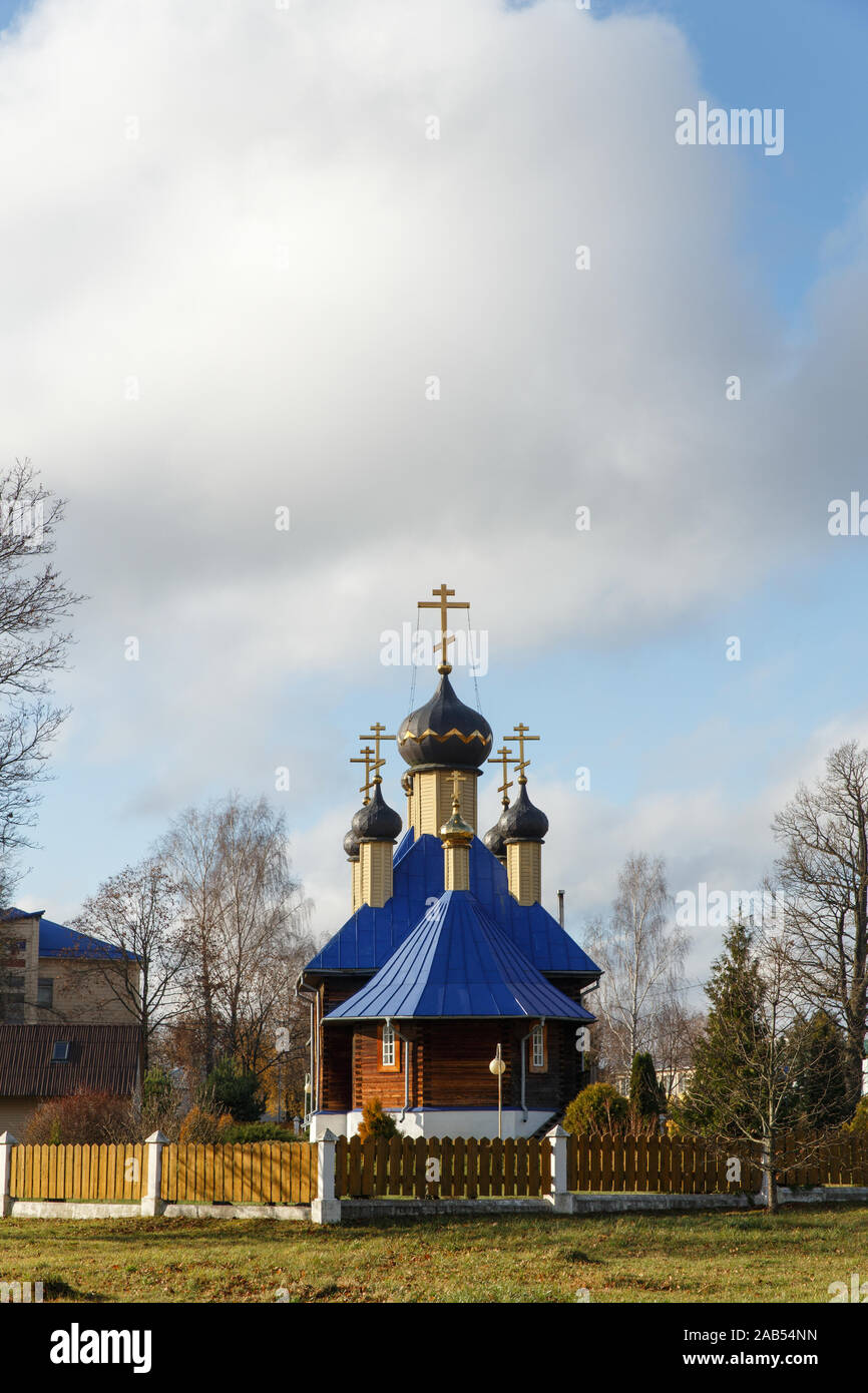 Wooden Orthodox church with golden domes and crosses Stock Photo - Alamy