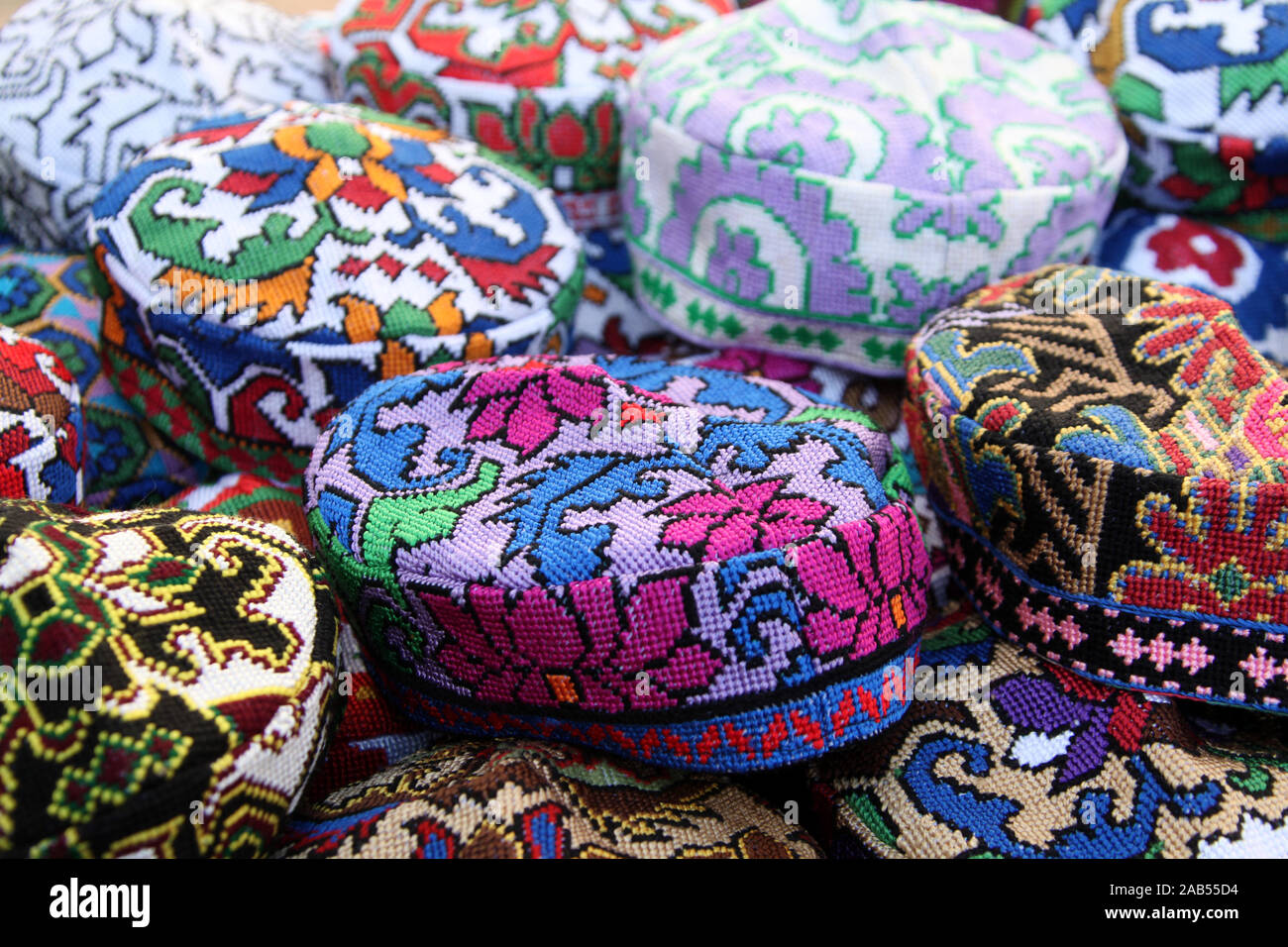 Beaded souvenir hats on sale in Central Asia Stock Photo
