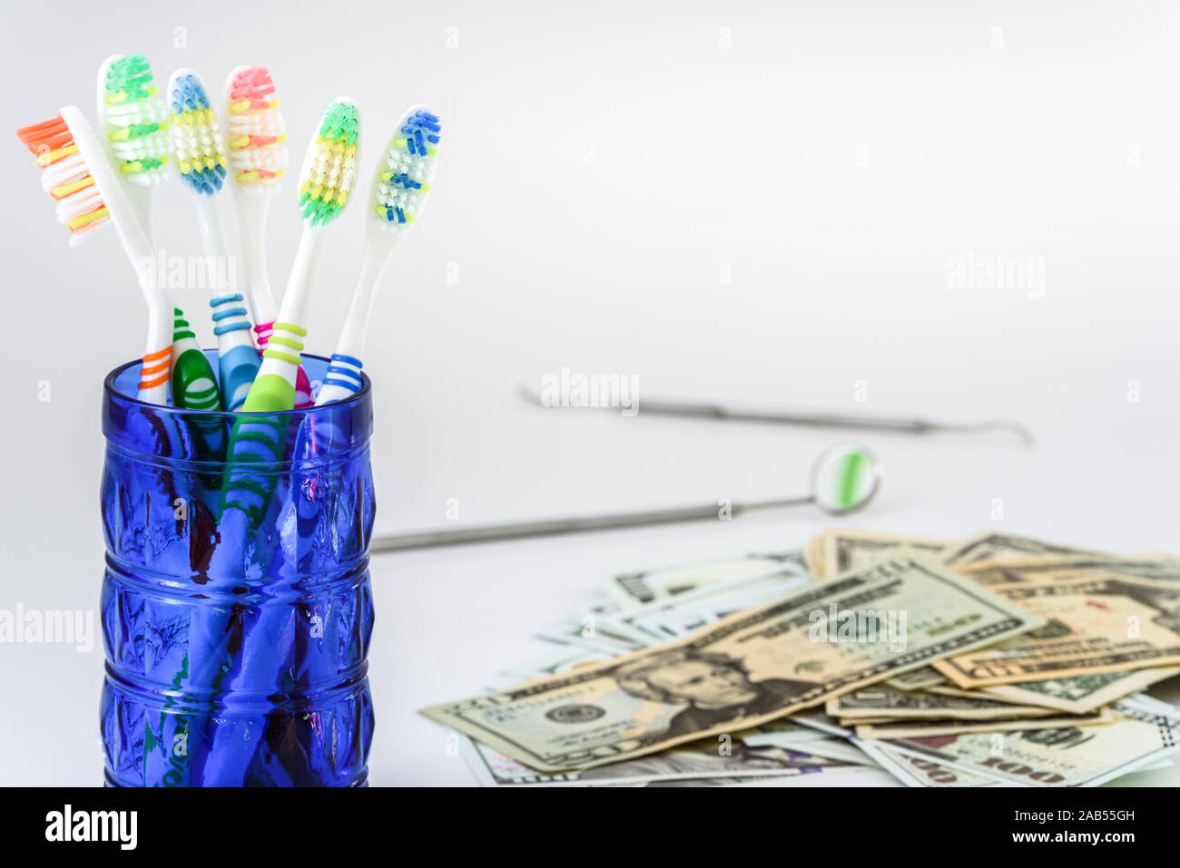 Toothbrushes and dentist set isolated on white background. Stock Photo